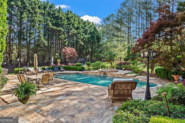 2120 Blackheath Trce, Alpharetta, GA 30005 - outdoor pool featuring a patio area and an outdoor hot tub