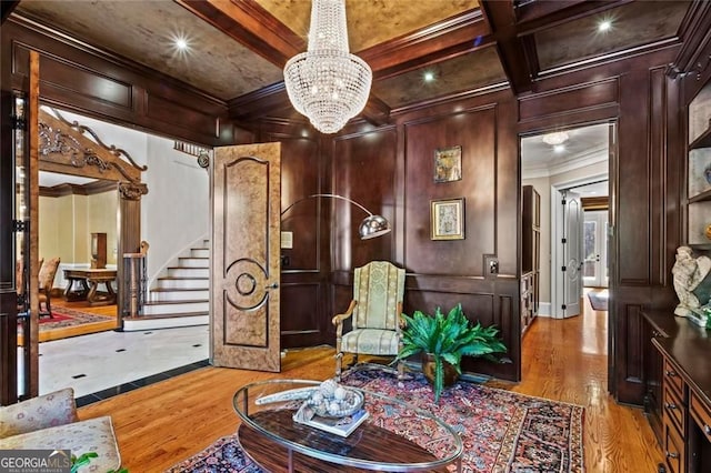 2120 Blackheath Trce, Alpharetta, GA 30005 - sitting room with light wood-type flooring, stairway, ornamental molding, a chandelier, and beamed ceiling