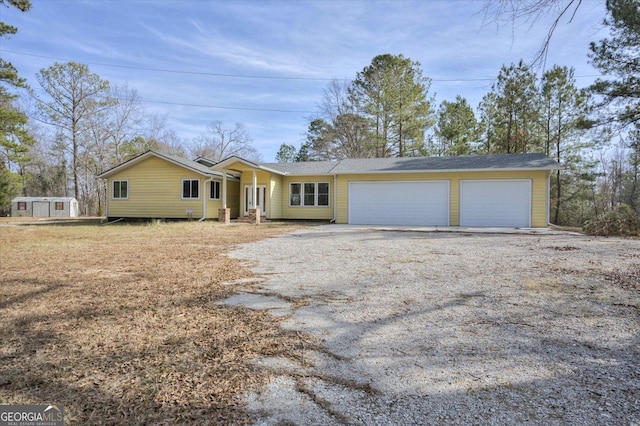5585 Rosemont Dr, Appling, GA 30802 - ranch-style home with an attached garage and driveway