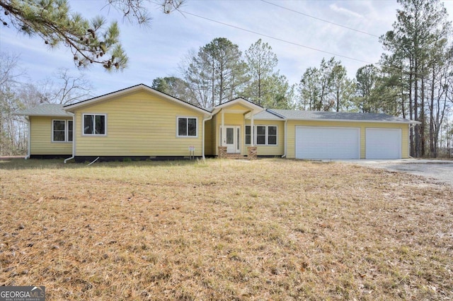 5585 Rosemont Dr, Appling, GA 30802 - ranch-style home featuring driveway, a front yard, and a garage