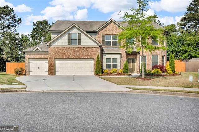 view of front of home with fence, a front lawn, brick siding, and concrete driveway