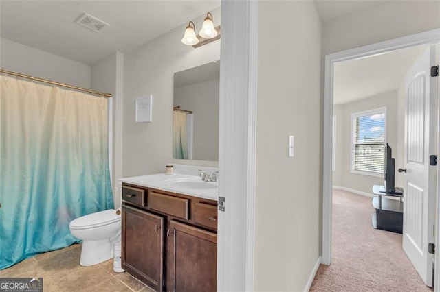 full bathroom with visible vents, toilet, vanity, and a shower with curtain