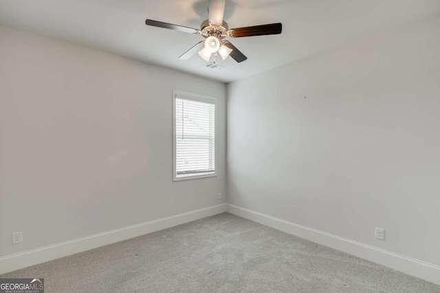 7208 Whitewater Dr, Flowery Branch, GA 30542 - empty room featuring light colored carpet and a ceiling fan