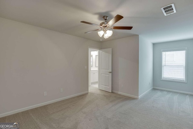 7208 Whitewater Dr, Flowery Branch, GA 30542 - spare room with a ceiling fan and light carpet
