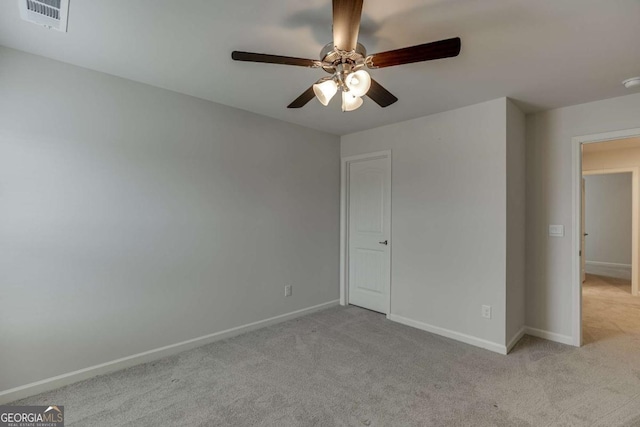 7208 Whitewater Dr, Flowery Branch, GA 30542 - unfurnished bedroom featuring light colored carpet and ceiling fan