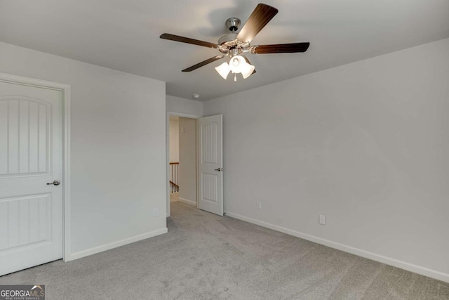 7208 Whitewater Dr, Flowery Branch, GA 30542 - unfurnished bedroom with carpet and ceiling fan