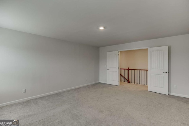 7208 Whitewater Dr, Flowery Branch, GA 30542 - spare room with carpet flooring and baseboards