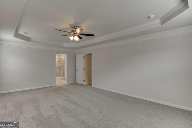 7208 Whitewater Dr, Flowery Branch, GA 30542 - carpeted spare room featuring a raised ceiling, crown molding, and a ceiling fan