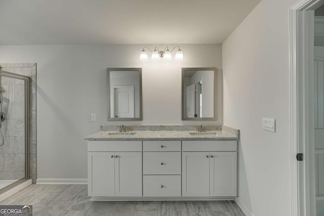 7208 Whitewater Dr, Flowery Branch, GA 30542 - full bathroom featuring a shower stall and double vanity