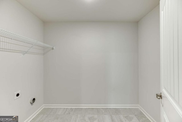 7208 Whitewater Dr, Flowery Branch, GA 30542 - laundry area featuring hookup for an electric dryer and baseboards