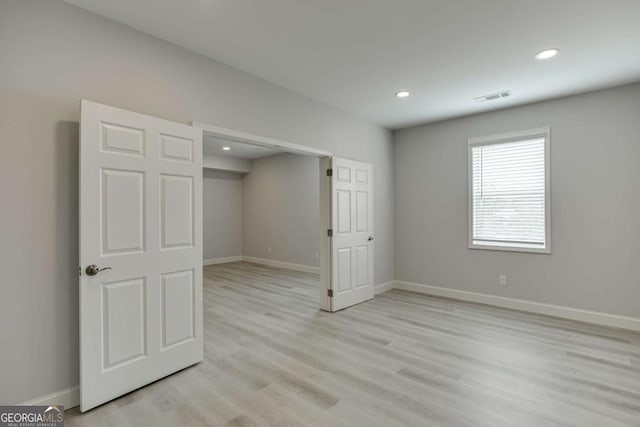 7208 Whitewater Dr, Flowery Branch, GA 30542 - basement featuring light wood-style floors and recessed lighting