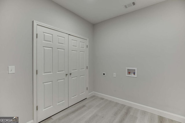 7208 Whitewater Dr, Flowery Branch, GA 30542 - laundry room featuring electric dryer hookup, light wood-style floors, and washer hookup