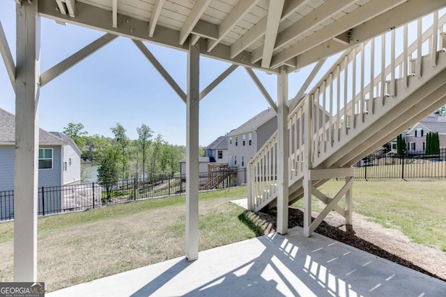7208 Whitewater Dr, Flowery Branch, GA 30542 - view of patio / terrace with stairway and a residential view