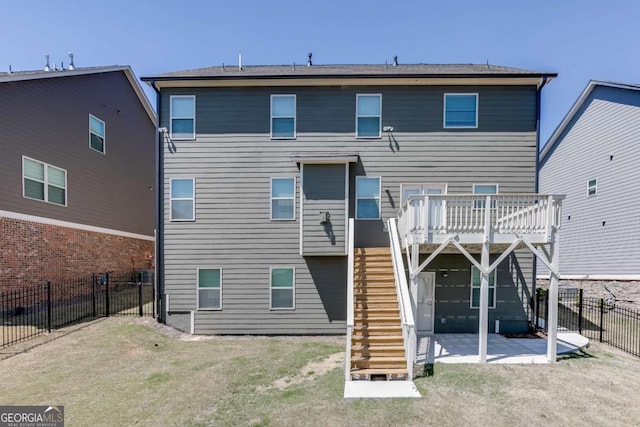 7208 Whitewater Dr, Flowery Branch, GA 30542 - rear view of property with stairs, a fenced backyard, a patio, and a deck
