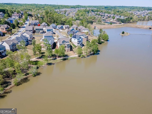 7208 Whitewater Dr, Flowery Branch, GA 30542 - aerial view of property and surrounding area featuring nearby suburban area and a large body of water