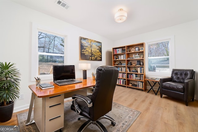 2215 Gordon Cir SE, Smyrna, GA 30080 - office area featuring visible vents and light wood finished floors