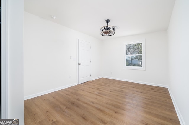 2215 Gordon Cir SE, Smyrna, GA 30080 - unfurnished room featuring light wood-style flooring and baseboards