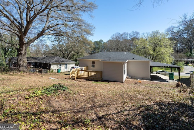2215 Gordon Cir SE, Smyrna, GA 30080 - exterior space featuring a carport and a deck