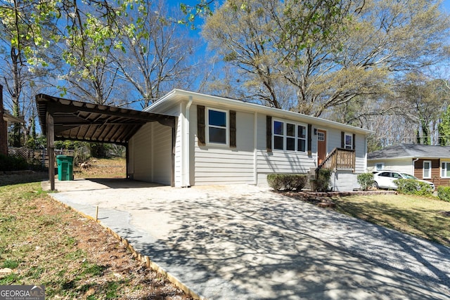 2215 Gordon Cir SE, Smyrna, GA 30080 - ranch-style house featuring a carport and driveway