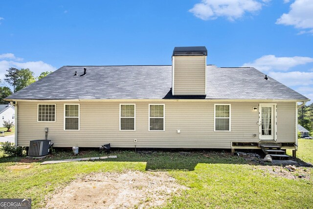 280 Brookview Dr, Dallas, GA 30132 - back of property with a lawn and central AC unit