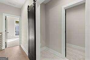 bathroom with baseboards