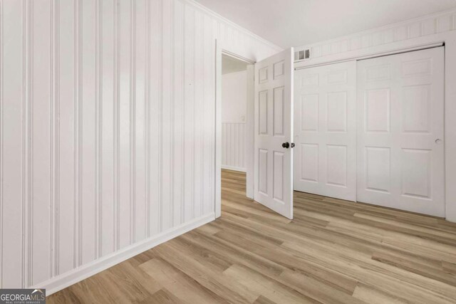 3556 Finch Rd SW, Powder Springs, GA 30127 - unfurnished bedroom featuring light wood-type flooring and a closet
