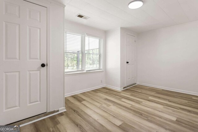 3556 Finch Rd SW, Powder Springs, GA 30127 - empty room with light wood finished floors and baseboards