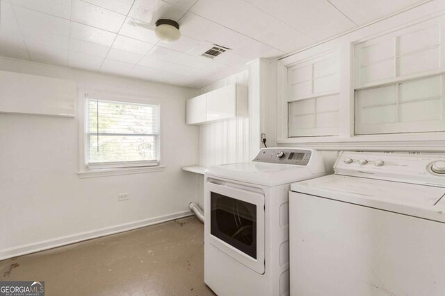 3556 Finch Rd SW, Powder Springs, GA 30127 - washroom with washing machine and clothes dryer and baseboards