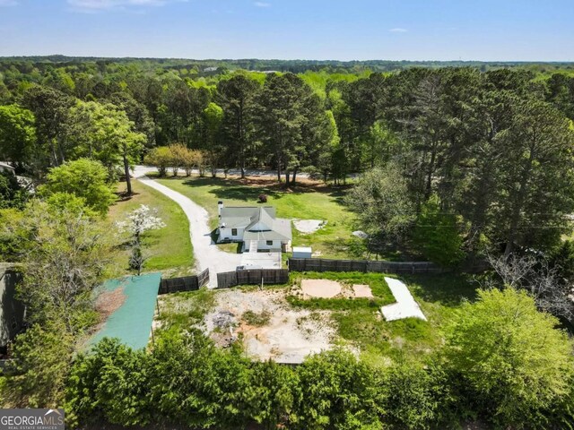 3556 Finch Rd SW, Powder Springs, GA 30127 - aerial view of property and surrounding area featuring a heavily wooded area