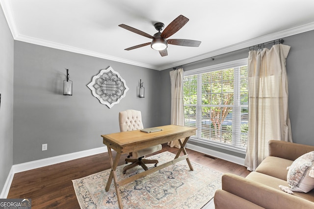 office with wood finished floors, visible vents, ornamental molding, baseboards, and ceiling fan