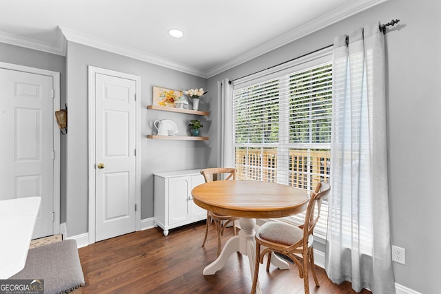 dining room featuring baseboards, ornamental molding, dark wood-style floors, and recessed lighting