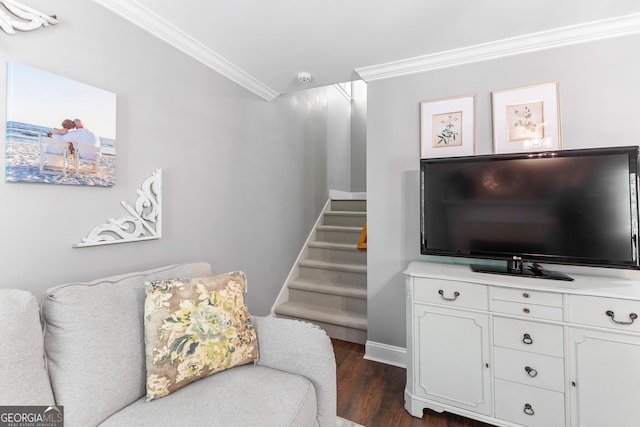 living area featuring baseboards, stairway, dark wood-style floors, and ornamental molding