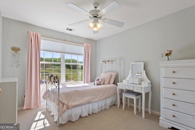 bedroom featuring baseboards, ceiling fan, light carpet, and visible vents