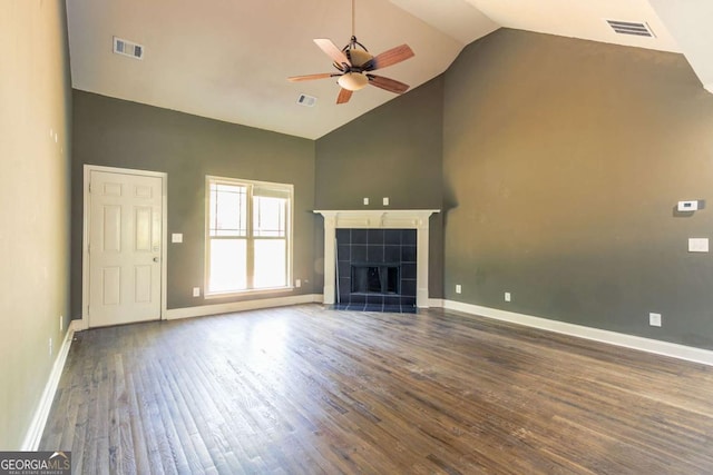 100 Hickory Dr, Stockbridge, GA 30281 - unfurnished living room featuring wood finished floors, a ceiling fan, visible vents, and high vaulted ceiling