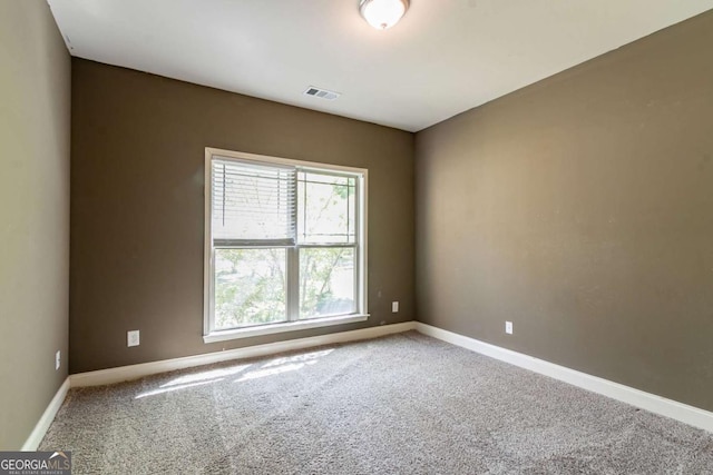 100 Hickory Dr, Stockbridge, GA 30281 - unfurnished room with carpet, visible vents, and baseboards