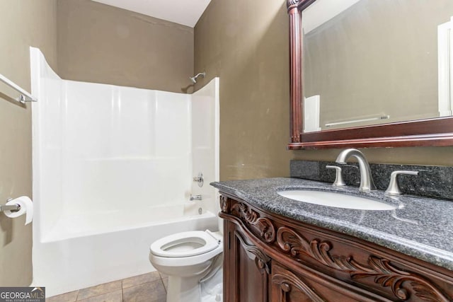 100 Hickory Dr, Stockbridge, GA 30281 - full bath with tile patterned floors, vanity, shower / tub combination, and toilet