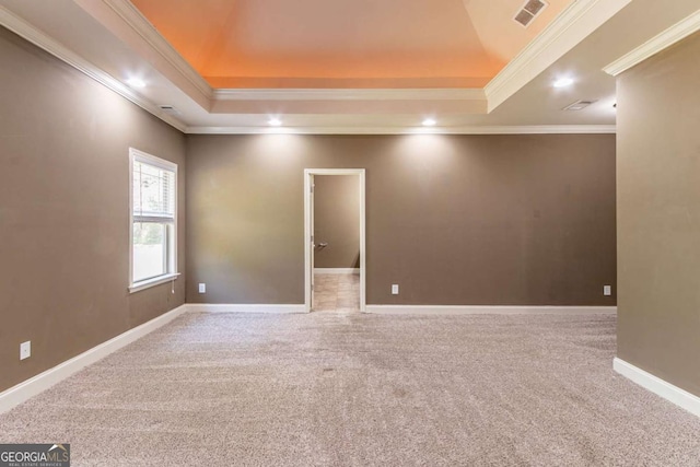 100 Hickory Dr, Stockbridge, GA 30281 - carpeted spare room with crown molding, a tray ceiling, baseboards, visible vents, and recessed lighting