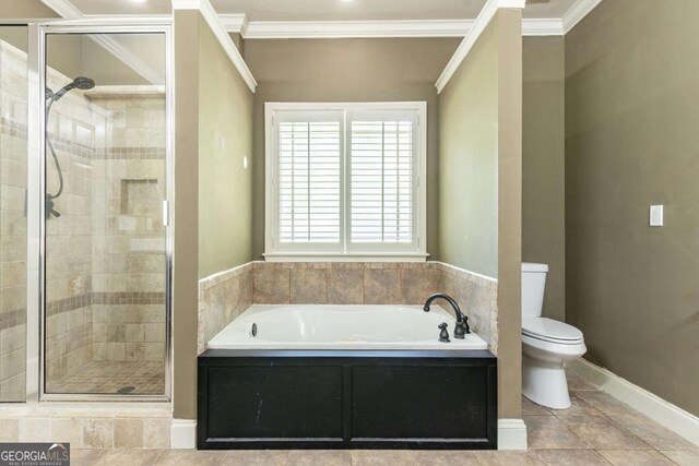 100 Hickory Dr, Stockbridge, GA 30281 - full bath featuring crown molding, a garden tub, a shower stall, and toilet
