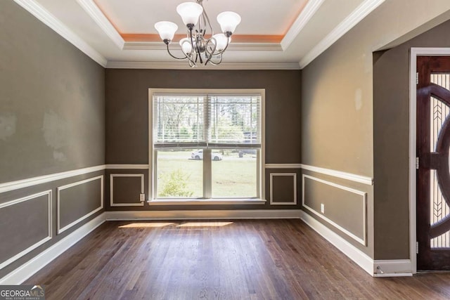 100 Hickory Dr, Stockbridge, GA 30281 - unfurnished dining area with a tray ceiling, dark wood-style floors, a chandelier, and a healthy amount of sunlight
