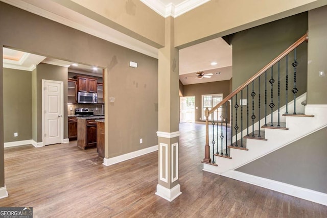 100 Hickory Dr, Stockbridge, GA 30281 - foyer with baseboards, ornamental molding, and wood finished floors