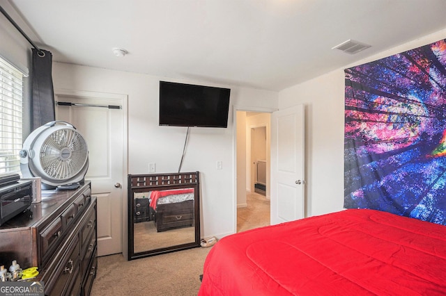 129 Coldwater Way, Griffin, GA 30224 - bedroom with visible vents, carpet, and a closet