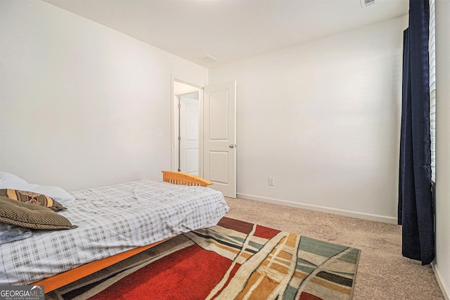 129 Coldwater Way, Griffin, GA 30224 - bedroom with light carpet and baseboards