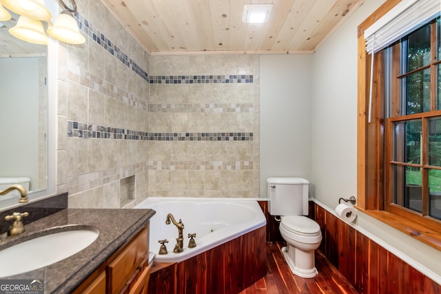 bathroom featuring toilet, wood finished floors, a whirlpool tub, wood ceiling, and vanity