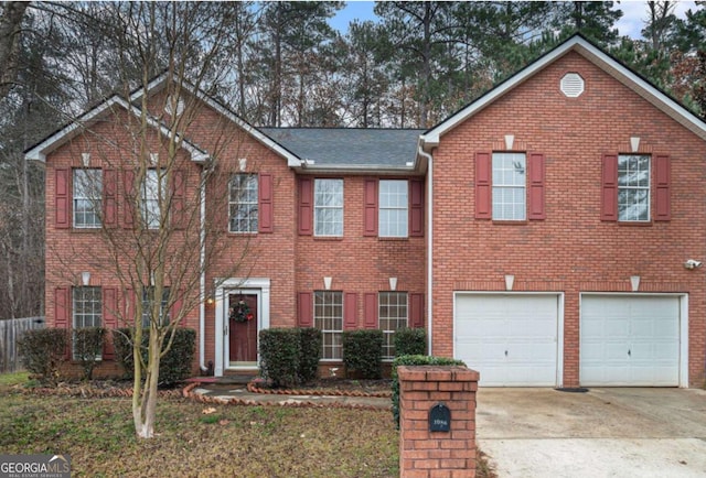 1086 Deshon Trl, Lithonia, GA 30058 - view of front of house featuring driveway, brick siding, and a garage