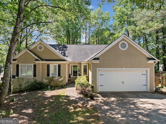 614 Springharbor Dr, Woodstock, GA 30188 - ranch-style home with driveway, stucco siding, a garage, fence, and roof with shingles