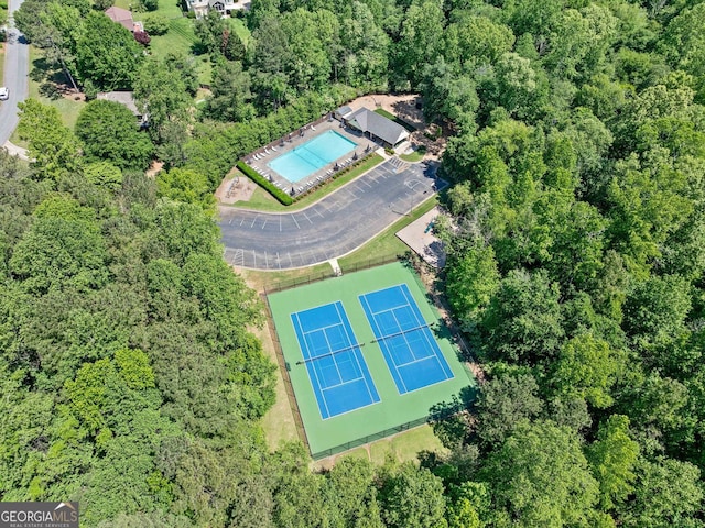 614 Springharbor Dr, Woodstock, GA 30188 - bird's eye view of a pool and a forest