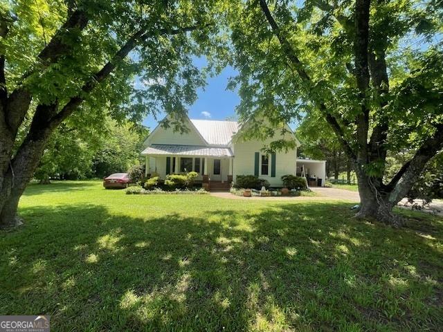 7650 Neese Commerce Rd, Hull, GA 30646 - back of property featuring a yard and covered porch