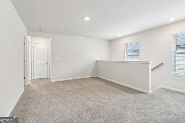 2762 Aralynn Way, College Park, GA 30337 - spare room with attic access, carpet, visible vents, recessed lighting, and baseboards