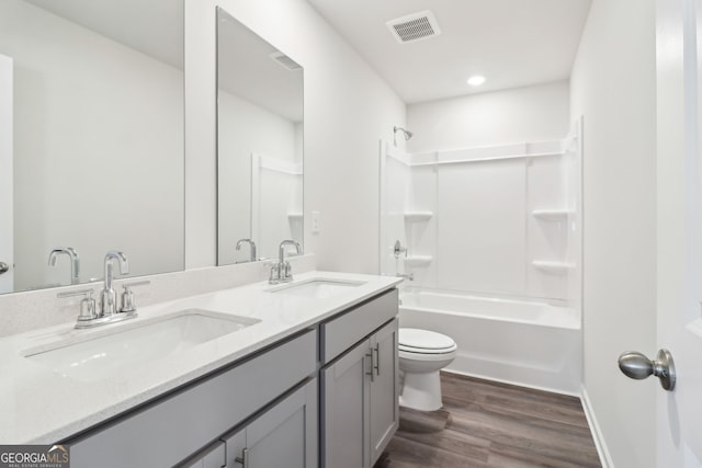 2762 Aralynn Way, College Park, GA 30337 - full bath featuring toilet, visible vents, wood finished floors, and a sink