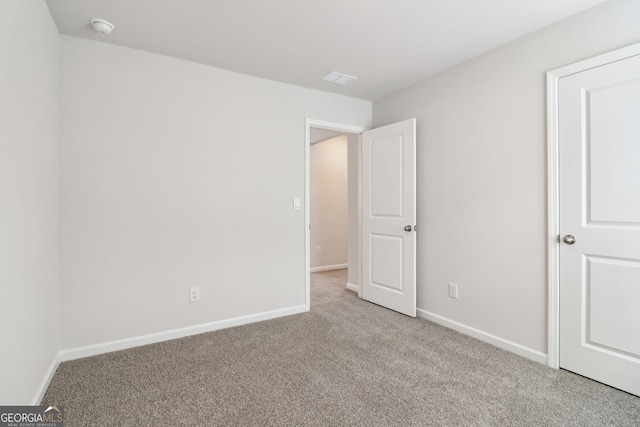 2762 Aralynn Way, College Park, GA 30337 - unfurnished bedroom featuring carpet and baseboards